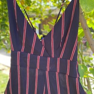 cross back burgundy/purple striped jumpsuit